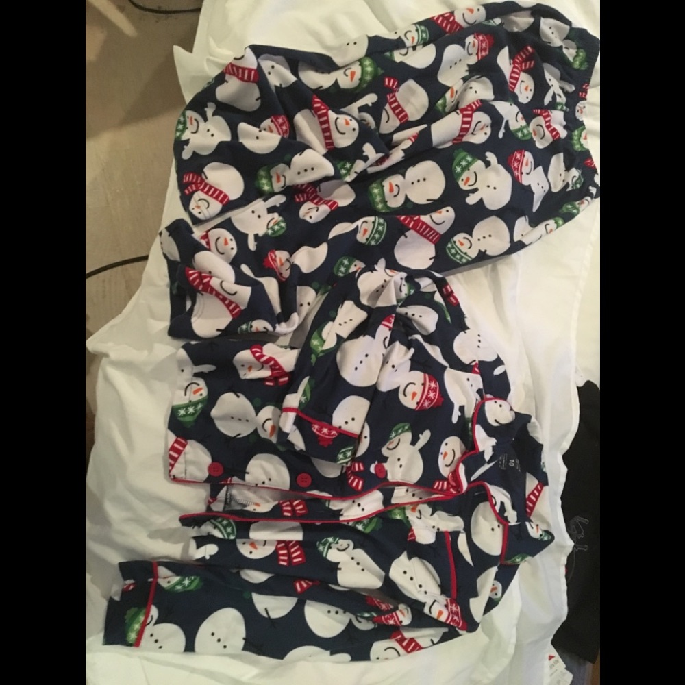 Carter’s boys Christmas pajamas. Size 10. Button up top and elastic waist pants.